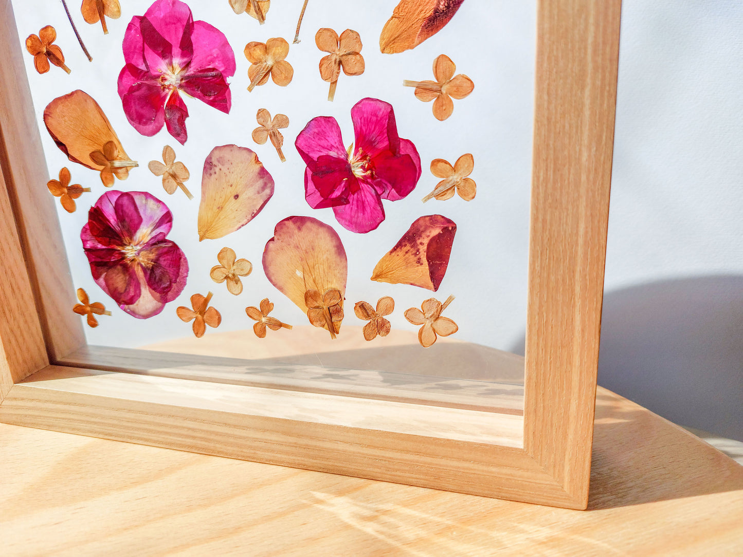 Details Pink and beige Geranium lilac pressed flower art rose petal on plexiglass with wooden arch frame