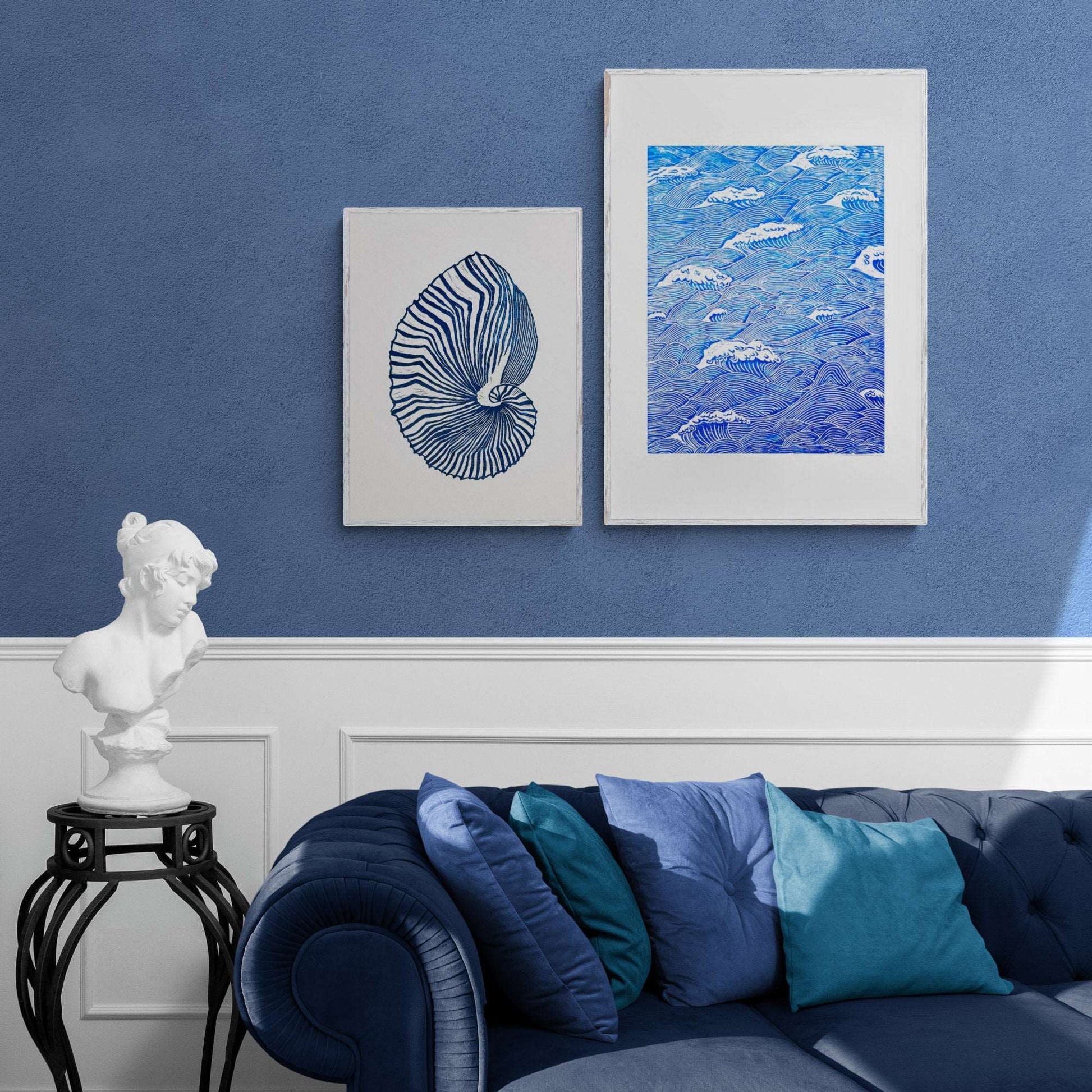 Gallery wall with shell and blue waves linocut prints