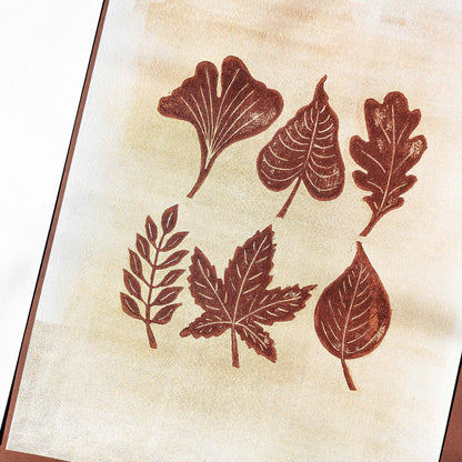Brown and gold gallery wall set of 2 linocut print woodblock leaves wood slice original artwork cottagecore autumn wall art bedroom decor one of a kind farmhouse gift linogravure printmaking grandmother gift, thoughtful teacher gift, grandma gift, going away gift for coworker, godparent gift, godmother gift, girlfriend gift, One of a Kind Fall Gift, Gratitude Gift for Mentor, gift for the home, gift for best friend, female, foraged wall art, Floral wall art