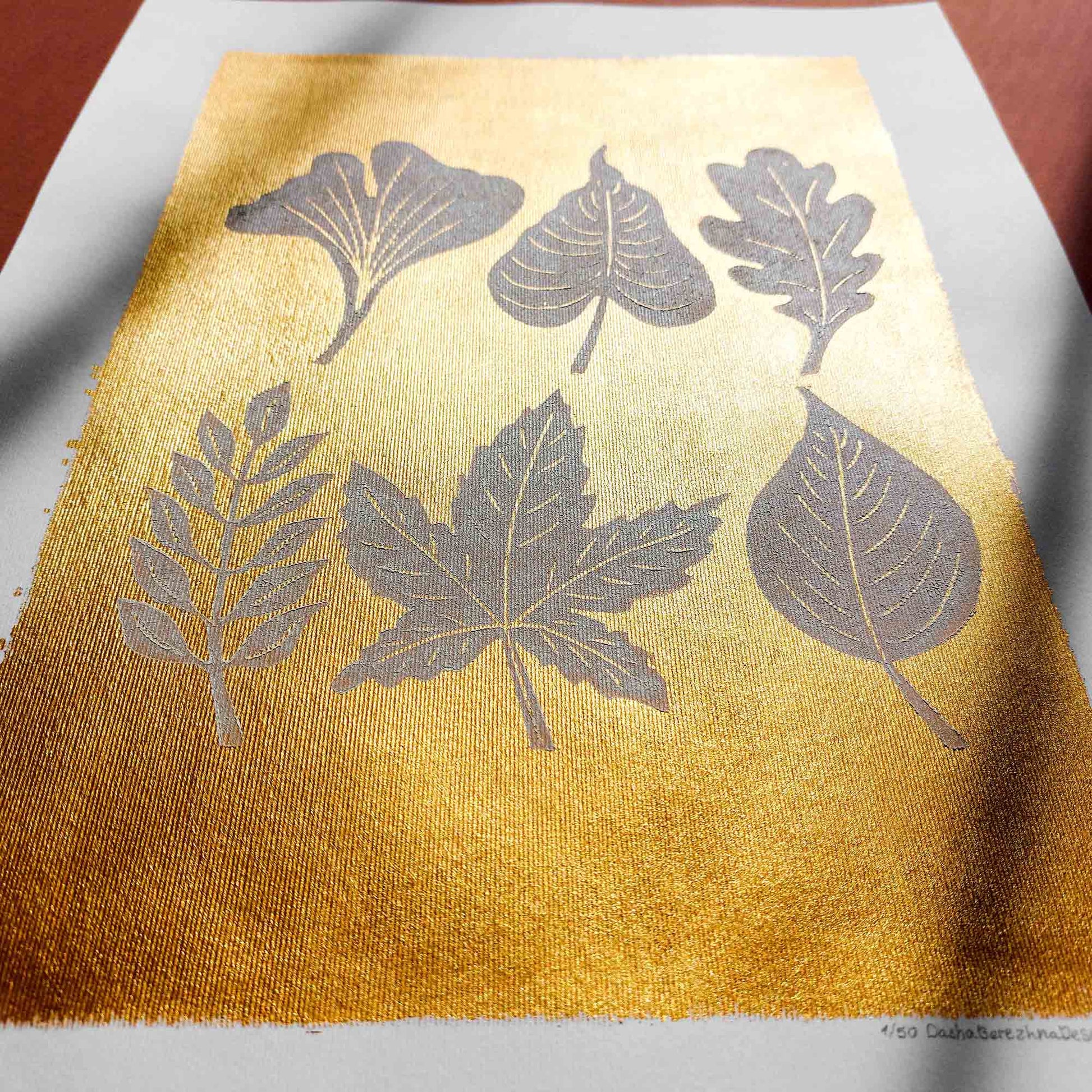 gold acrylic white oil ink autumn wall art linocut print white leaves foraged rustic fall new home gift original artwork thanksgiving table hallway decor grandmother hostess gift one of a kind linogravure botanical office lino cottagecore nature lover leaf farmhouse thank you bedroom printmaking handprinted farm minimalist self sister mom mother hostess new apartment godmother wife woman living room kitchen handmade dining for Her Thankful Gratitude Entryway Dorm Warm Earth Tones Seasonal