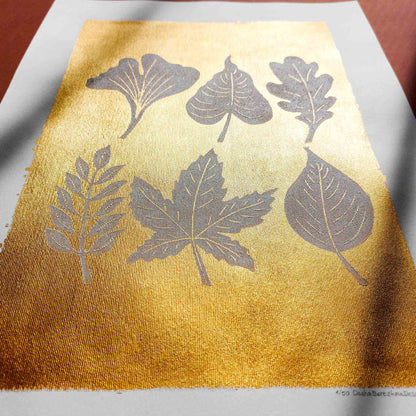gold acrylic white oil ink autumn wall art linocut print white leaves foraged rustic fall new home gift original artwork thanksgiving table hallway decor grandmother hostess gift one of a kind linogravure botanical office lino cottagecore nature lover leaf farmhouse thank you bedroom printmaking handprinted farm minimalist self sister mom mother hostess new apartment godmother wife woman living room kitchen handmade dining for Her Thankful Gratitude Entryway Dorm Warm Earth Tones Seasonal