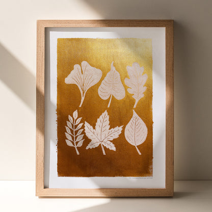 gold acrylic white oil ink autumn wall art linocut print white leaves foraged rustic fall new home gift original artwork thanksgiving table hallway decor grandmother hostess gift one of a kind linogravure botanical office lino cottagecore nature lover leaf farmhouse thank you bedroom printmaking handprinted farm minimalist self sister mom mother hostess new apartment godmother wife woman living room kitchen handmade dining for Her Thankful Gratitude Entryway Dorm Warm Earth Tones Seasonal